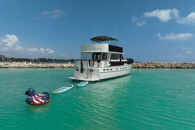2 Hour Sunset-53' Hatteras Tulum, Playa Del Carmen, Riviera Maya - The dock-to-sunset routine: rum punch, top-ups, and a real meal