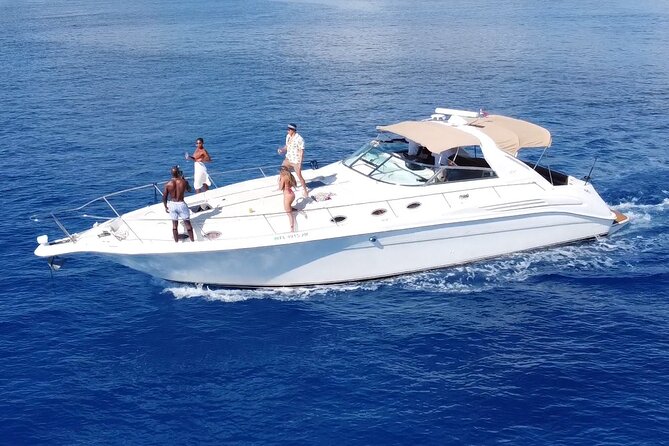 4 hours - Private 48ft Yacht all inclusive in Tulum and Playa del Carmen - Weather and plan changes: how the day stays worth it