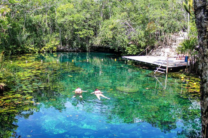 4 Private Cenotes, Zip-Lines, Canoes & Mayan Village with Delicious Lunch - Canoes, Cave-like Swim Spots, and Cliff Jump Energy