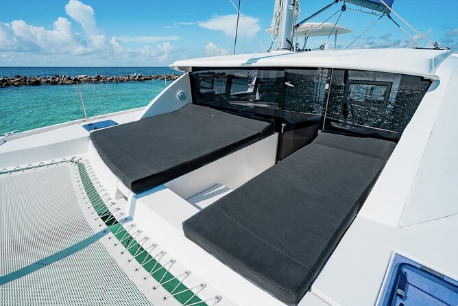 8-Hour Private 40' Cat 2 Stop to Cozumel, Food, Drinks & Snorkel - Lunch Under a Palapa (Or Staying Cozy Onboard)