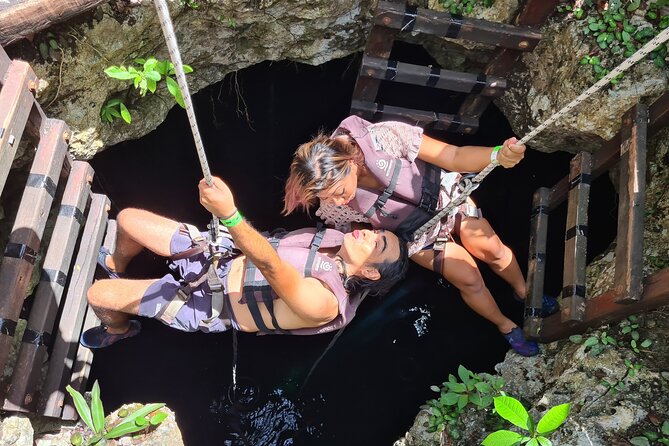 Adventure in a Private Mayan Community - Rappelling into a hidden cenote, then swimming