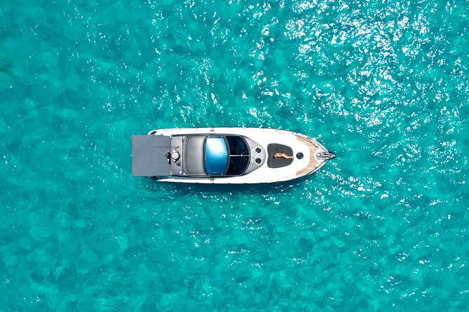 Cancun All Inclusive: Coast & Fun 9h on 50' Cranchi - 9 Hours of Snorkeling, Swim Stops, and Protected Bays