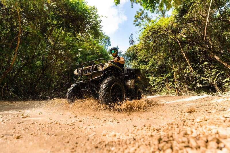 Cancun: Jungle ATV Tour, Ziplining, and Cenote Swim - Quad bike chaos in the Mayan jungle: mud time, bumpy trails, and safety reality
