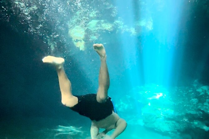 E-bike cenote jungle city tour in Playa del Carmen - The Hidden Cenote Stop: Snorkeling and Dock Jump Moments