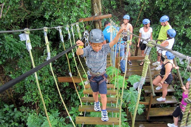 Extreme Day in Cancun: ATVs Zip Lines Cenote Lunch and Transport - Zip lines and suspension bridges over the jungle