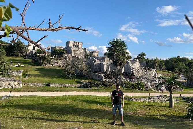 Guided Tour of Archaeological Zone of Tulum + Cenote Swim - Stop 1: Tulum Archaeological Zone on a cliffside setting