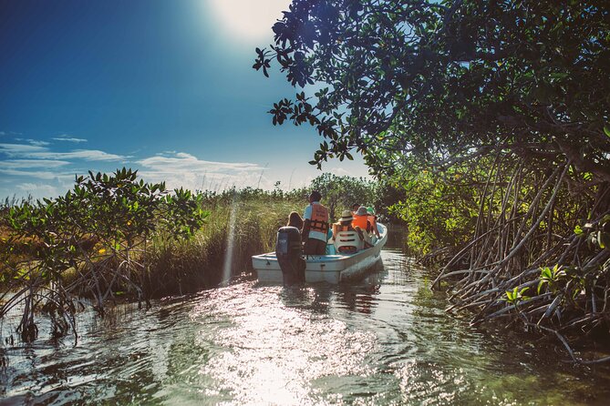 Half-Day Tour Discovering Sian Ka´an with Lunch - Stop 3: Quieter Lagoons, Coconut Groves, and Lunch with a View