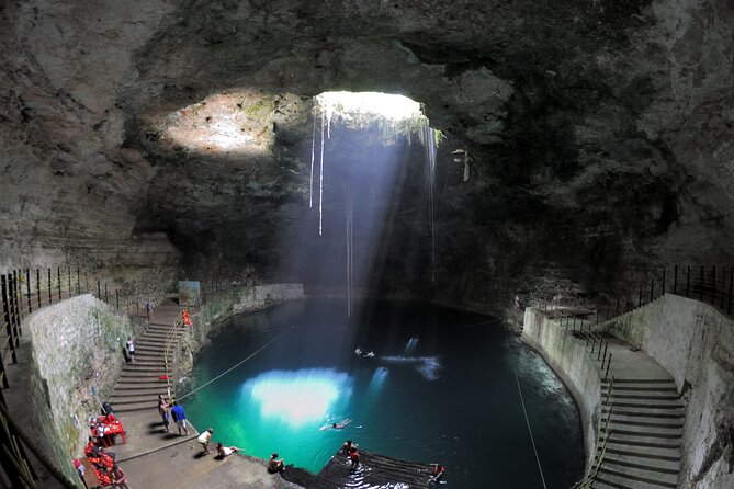 Hubiku & Ikkil Cenote, Valladolid and Chichen Itza! Deluxe From Playa Del Carmen - Cenote Hubiku: sunlight-beam vibes in a “go lower” setting