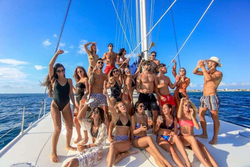 Isla Mujeres Plus Experience Catamaran Tour + Snorkel+Lunch - Catamaran Comfort, Open Bar, and the On-Board Mood