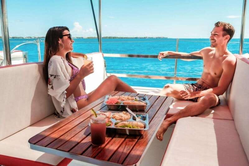 Isla Mujeres Plus Experience Catamaran Tour + Snorkel+Lunch - Lunch on Board: Baguette, Pasta, Fruit, and Dessert