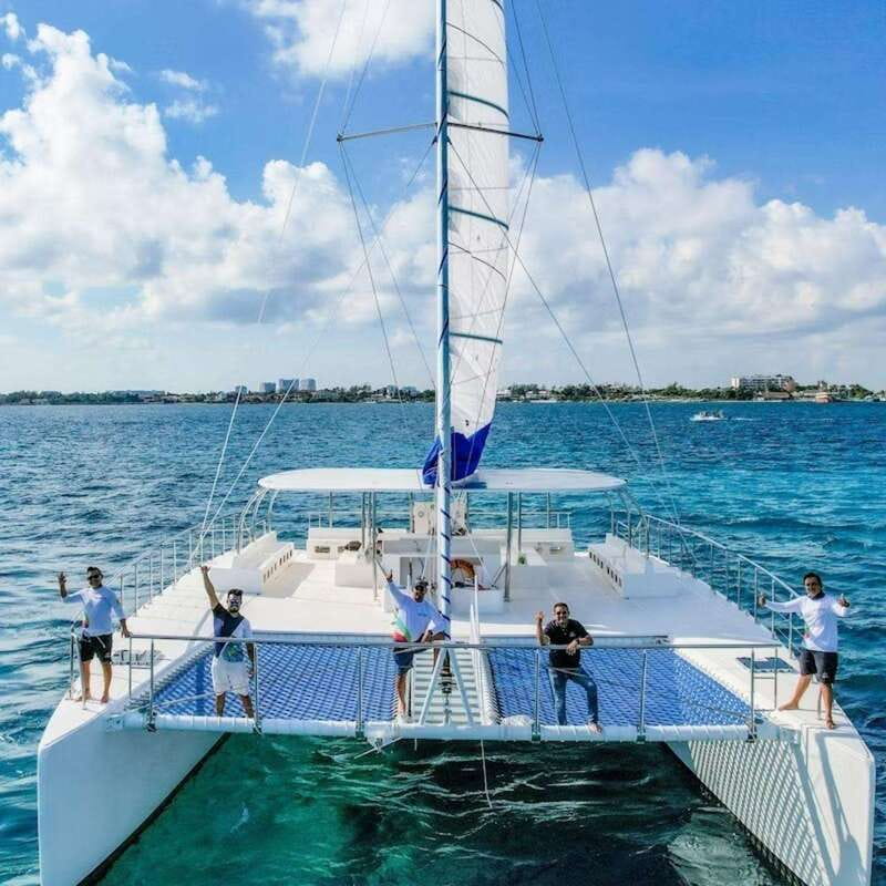 Isla Mujeres Plus Experience Catamaran Tour + Snorkel+Lunch - Return Cruise, Sunset Views, and the Spinnaker If Wind Allows