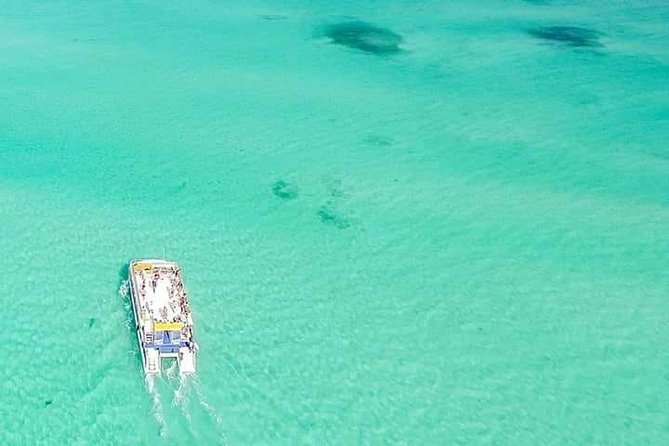 Isla Mujeres Unlimited! Fun & Party with transportation - Catamaran + crew energy: what the party vibe is like