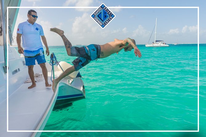 Luxury Catamaran tour to isla mujeres with transportation from Tulum - Drinks, Music, and Crew Energy: Fun When Communication Works