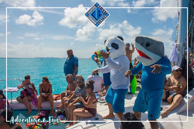 Luxury Catamaran tour to isla mujeres with transportation from Tulum - Isla Mujeres Beach Club + Buffet Lunch: Where the Day Shifts to Land Time