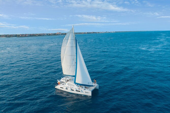 Luxury Sailing & Snorkeling Experience from Riviera Maya - Stop 2: a protected marina swim for a calmer reset