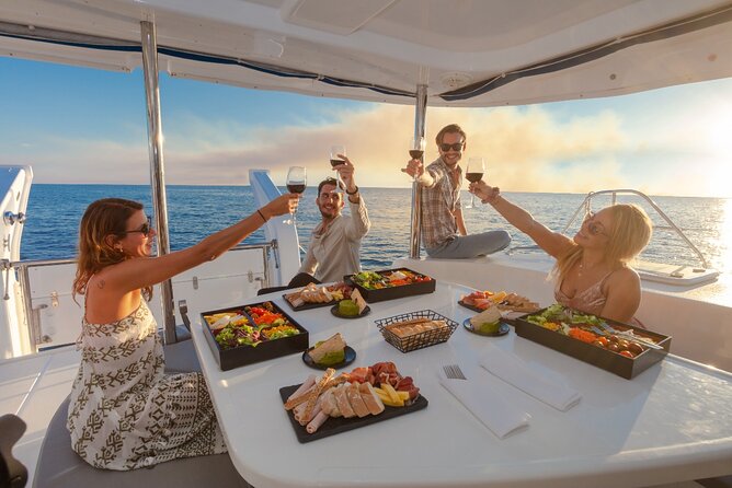 Luxury Sunset Cruise from Riviera Maya - Comfort on a small catamaran: seating, shoes, and rough-water reality