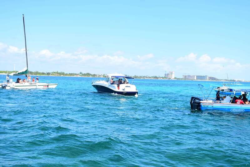 PDC: Isla Mujeres Catamaran Tour with Snorkeling - Returning at Sunset: Music, Open Bar, and Tequila Party Energy