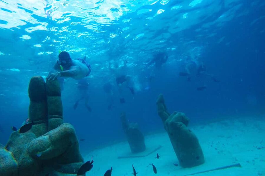 PDC: Isla Mujeres Catamaran Tour with Snorkeling - Price and Logistics: What You Really Pay on Top of $107