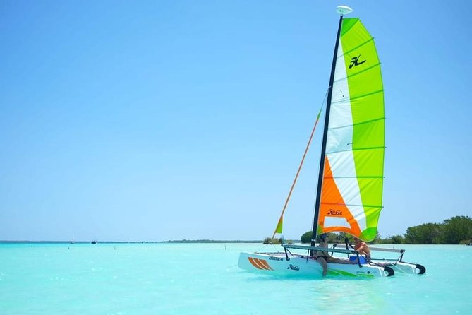 Private - Bacalar sailing across the mesmerizing waters - Seven-color sailing in Laguna Bacalar, powered by sail (not engines)