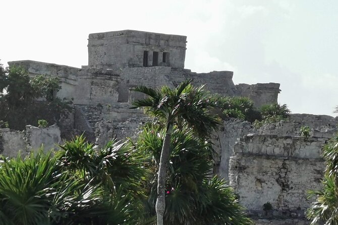 Private Full-Day Guided Tulum Coba and Cenote Tour with Lunch - Stop 1: Tulum Archaeological Site at Ruins-Watching Speed