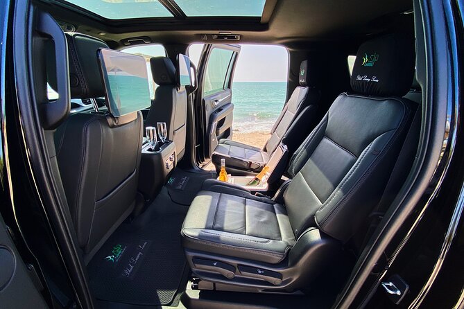 Private Luxury SUV Transfers from Tulum Airport - Where to meet: Black Luxury Service by STP Caribe and the name-on-a-tablet moment