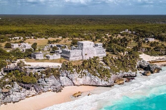 Private Tour to Tulum, Cenote and Swimming with Turtles - Cenote Taak Bi Ha in Parque Dos Ojos: clear water, rock shapes, and a snorkel-first stop