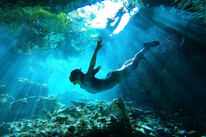 Ride to a life changing cenotes tour - Biking from Chemuyil to protected cenotes with locals