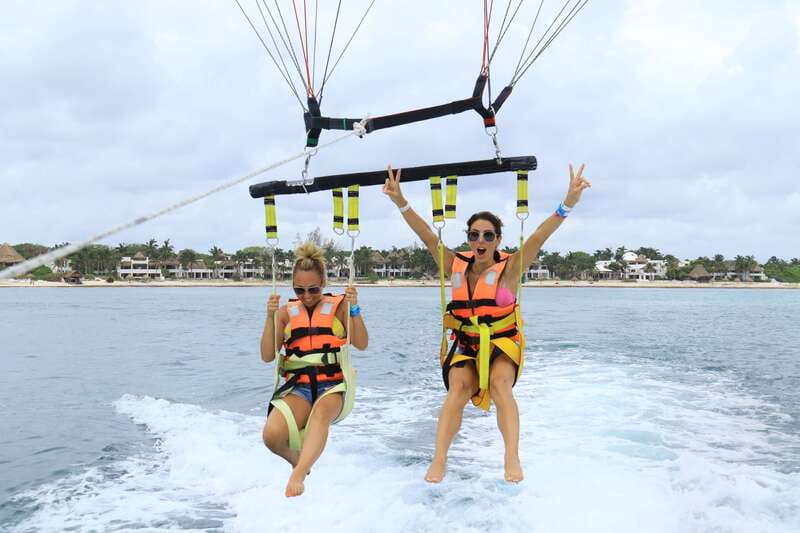 Riviera Maya: Parasailing Tour with Beach Club Access - Pickup and shared transport: how the day starts