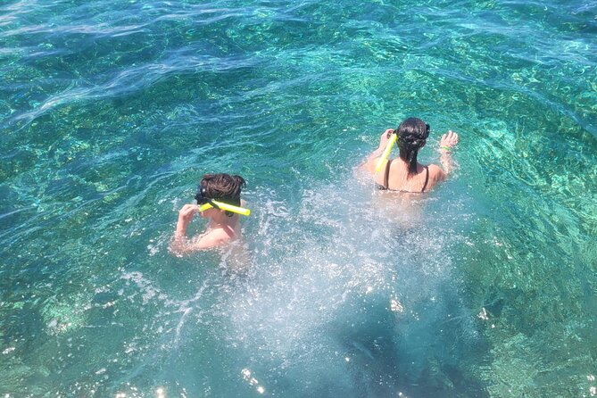 Tour to Cozumel by Catamaran with Snorkeling and Buffet Lunch - Lunch and beach club time at Playa Mia: what you actually get from 2:30–4:00