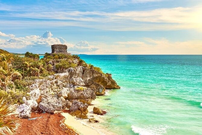 Tour Tulum Coba Cenote and Playa del Carmen (4 in 1) - Stop 1: Tulum Archaeological Site with a bilingual guide