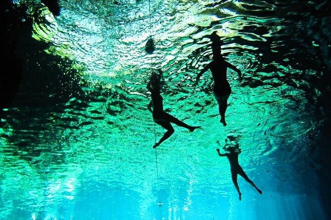 Tulum Day Trip: Pyramids + Reef Snorkel & Cenote Swim - Stop 1: Tulum Archaeological Site Cliff Views and Mayan Stories