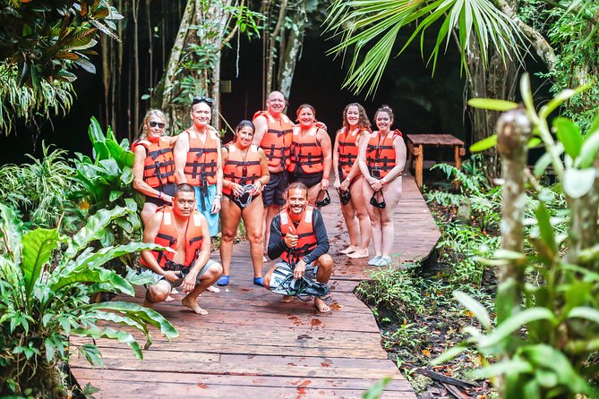 Tulum Ruins and Cenote Swim: History and Nature Combo Tour - Entering Tulum: cliff views, El Castillo, and Mayan trader signals