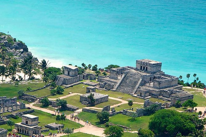 Tulum Ruins & Cobá Ruins Adventure (Private, Full Day) - Tulum Archaeological Site: Beach Setting, Palms, and Iguanadaily Life