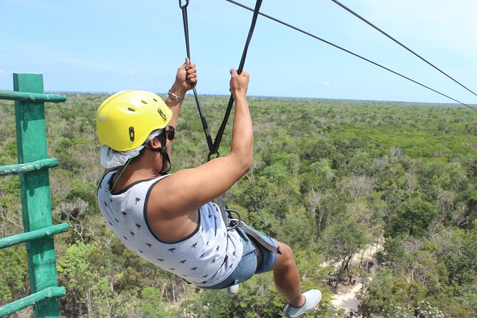 Tulum's Thrilling Jungle: ATV, Zip Lines, Cenote & More! - Cenote swimming and cave exploration with a lifejacket